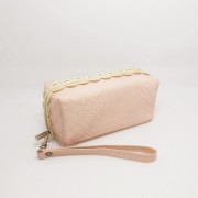 lady women's pink cosmetic wristlet bag
